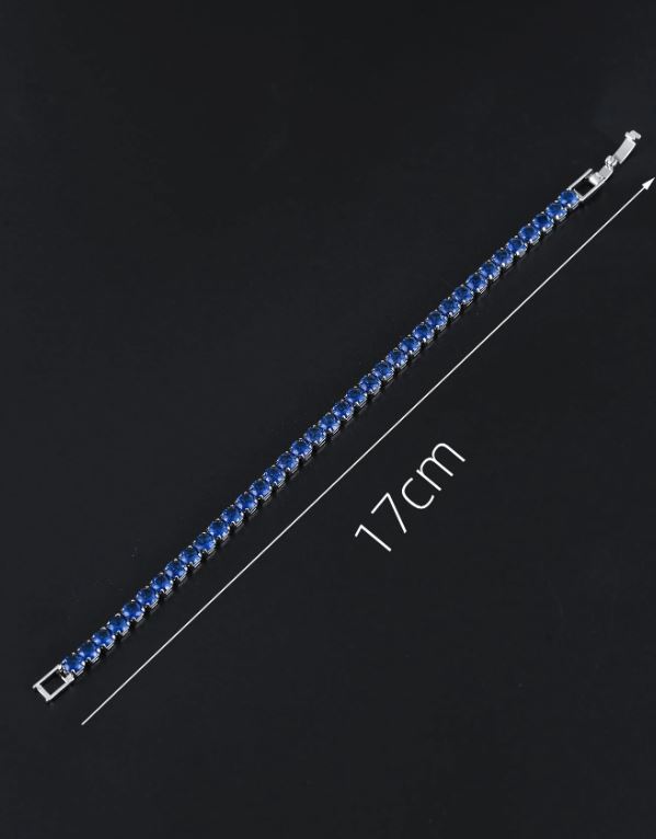 Blue beaded bracelet with measurement label on a black background
