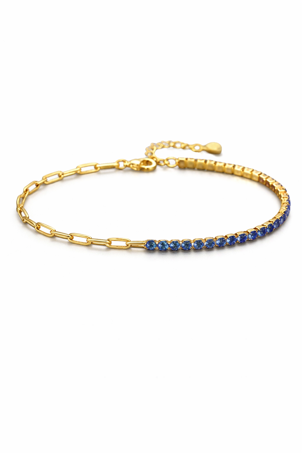 Gold bracelet with blue stones on a white background