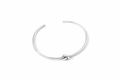 Silver bracelet with a knot design on a white background