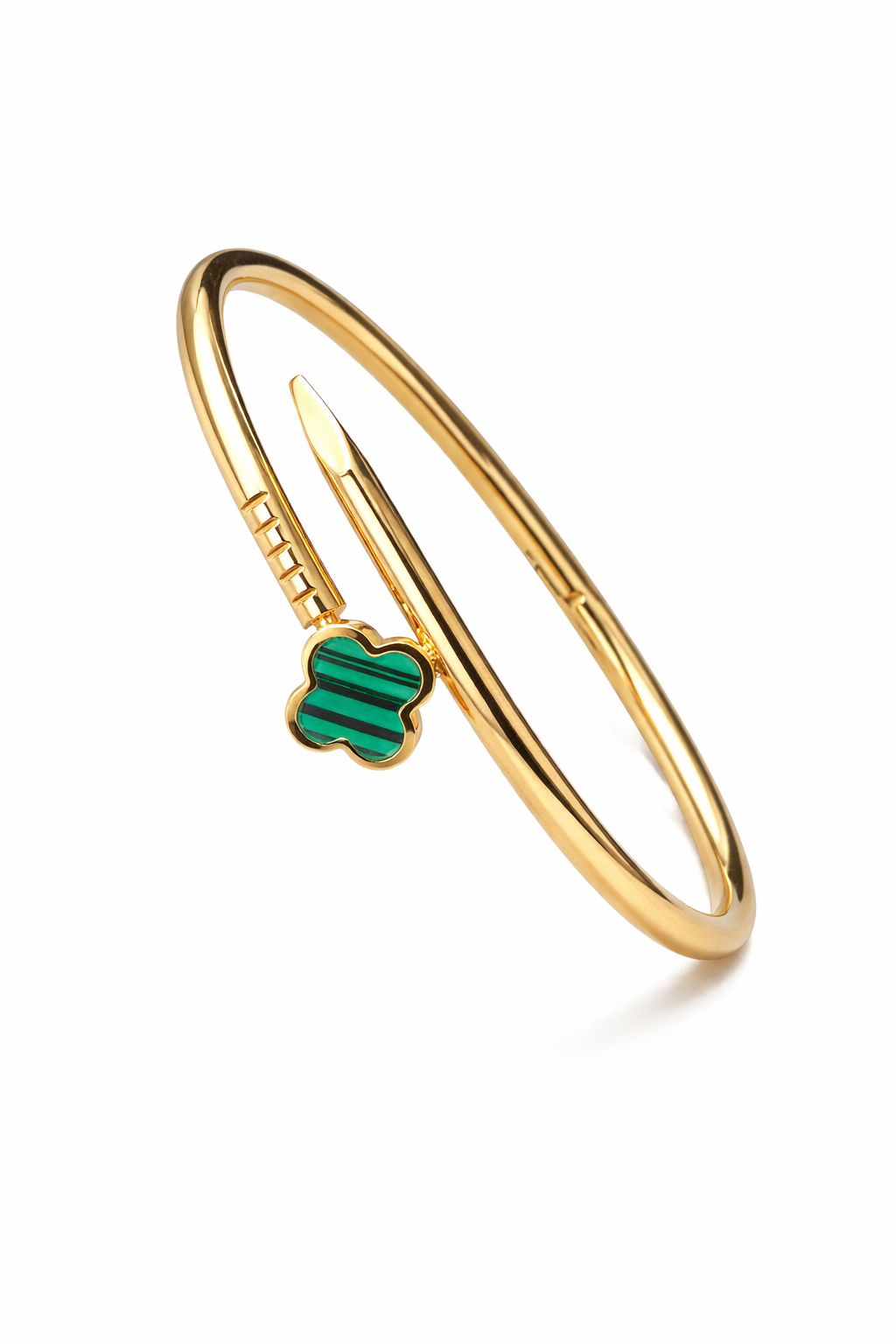 Gold bracelet with a green clover charm on a white background