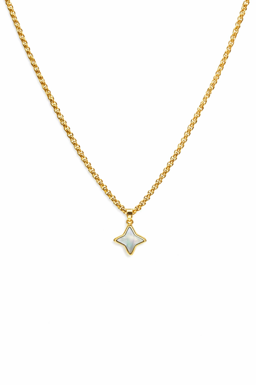 Gold necklace with a star-shaped pendant on a white background